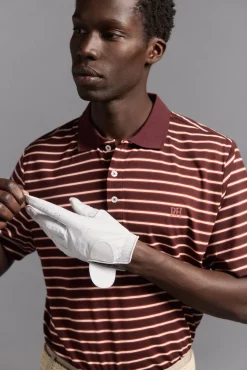 Polo de golfe riscas