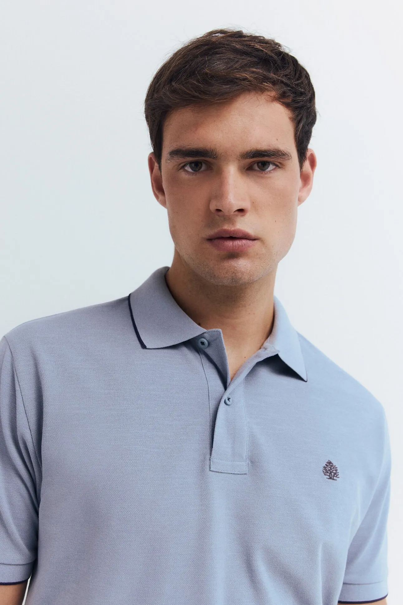 Polo piqué chique com gola canelada de corte regular