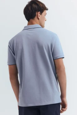 Polo piqué chique com gola canelada de corte regular