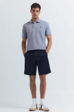 Polo piqué chique com gola canelada de corte regular