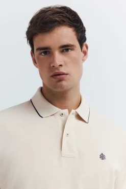 Polo piqué chique com gola canelada de corte regular