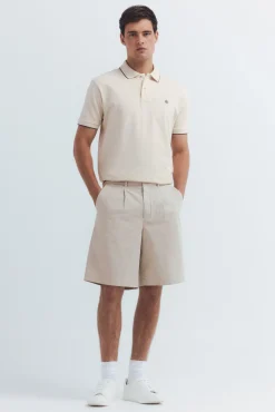 Polo piqué chique com gola canelada de corte regular