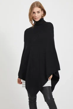 Poncho de malha com gola alta