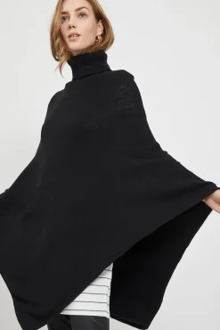 Poncho de malha com gola alta