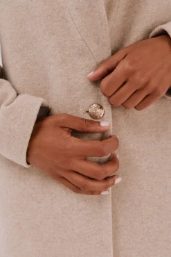 Sobretudo com detalhe efeito pelo