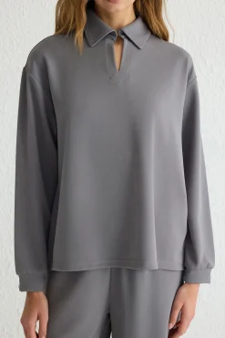 Top de blusa e calça gola polo cinza